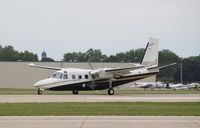 N544GA @ KOSH - Commander 690D - by Mark Pasqualino