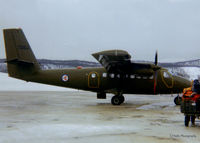 7062 @ ENDU - Scanned from a print, RNoAF Twin Otter '7062' hard at work on the ramp at Bardufoss (ENDU) March 1980. - by Clive Pattle