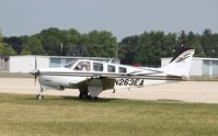 N263EA @ KOSH - Beech A36 - by Mark Pasqualino