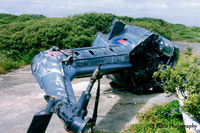 XS529 @ EGDO - Scanned from print. Ex 829 NAS Wasp HAS.1 XS529 remains lying at RNAS Predannack, Cornwall (EGDO) in July '97.  Previously based on HMS Tartar and HMS Galatea - by Clive Pattle