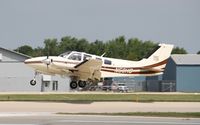 N50HG @ KOSH - Beech 58P - by Mark Pasqualino