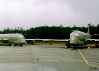 XV234 @ EGQK - Scanned from print - Nimrod MR.2's XV234 (right ) and XV242 (left) in store on the Northern Dispersal Loop at RAF Kinloss (EGQK) Feb '96. Both aircraft were later used in the ill-fated Nimrod MR.4A programme and presumably got the chop. - by Clive Pattle