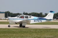 N1767G @ KOSH - Beech B33