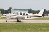 N69CJ @ KOSH - Beech 36 - by Mark Pasqualino