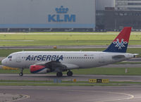 YU-APF @ EHAM - Taxi to the runway of Schiphol Airport - by Willem Göebel