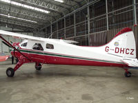 G-DHCZ @ EGSU - Hangared at the IWM Duxford - by Clive Pattle