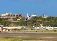 N280BD @ TNCM - N280BD