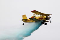 N6774K @ KALO - Aerial application demonstration at the air show