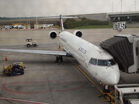 N326PQ @ DTW - This plane was only two days old when I was on it.  Still had the new plane smell.  Also, this was only trip number 10 for this plane.  Taken at DTW