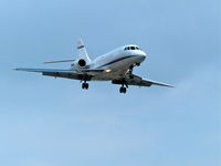 T7-NIK @ CYYZ - Dassault Falcon 2000, T7-NIK, built n 1996 and registered to a private owner in San Marino. Short finals, runway 23, Lester B. Pearson International Airport, Toronto (YYZ). - by Len Preskow