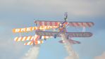 N5057V @ EGKA - The Breitling Team in action at the superb 25th Anniversary RAFA Shoreham Airshow.