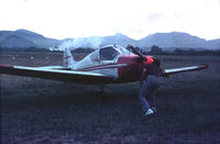F-PKMA @ LFMD - Myself, André GIAUFFER, 16 years old, inside the Mistralet for a solo flight at Cannes Mandelieu airport France in 1963. Picture taken by may father, same first name. My instructor, LAVIGNE, winds the propeller to start because there was no starter. - by André GIAUFFER