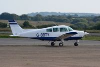 G-BBTY @ EGFH - Visiting Beech Sundowner 180. - by Roger Winser