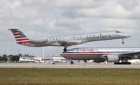 N925AE @ MIA - American Eagle E145 - by Florida Metal