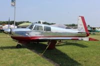 N9243M @ KOSH - Mooney M20E - by Mark Pasqualino