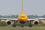 D-AEAK @ EGGW - DHL lining up at LTN - by FerryPNL