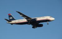N654AW @ KSNA - Airbus A320 - by Mark Pasqualino
