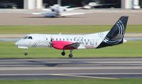 N347AG @ TPA - Silver Saab 340B - by Florida Metal
