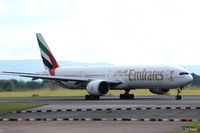 A6-EBS @ EGCC - Manchester Taxi - by Clive Pattle