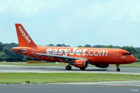 G-EZUI @ EGCC - In special scheme - by Clive Pattle