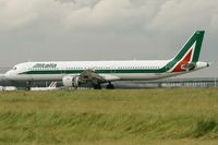 I-BIXA @ LFPG - Airbus A321-112, Reverse thrust  landing Rwy 26L, Roissy Charles De Gaulle Airport (LFPG-CDG) - by Yves-Q