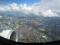 RP-C3228 - Climbing out of Manila - by Micha Lueck
