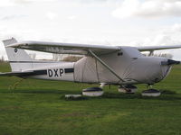 ZK-DXP @ NZHN - Keeping warm at Hamilton - flying club grass area. - by magnaman