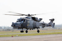 ZZ397 @ EGFH - Royal Navy Wildcat HMA.1, call sign, Talon 704, seen hover taxxing at EGFH. - by Derek Flewin