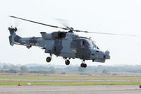 ZZ397 @ EGFH - Wildcat HMA.1, call sign, Talon 704, seen shortly after lifting at EGFH following a hot refuel.