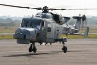 ZZ397 @ EGFH - Visiting Navy Wildcat HMA.2 helicopter operated by AgustaWestland, Yeovil setting down at Swansea Airport.  - by Roger Winser