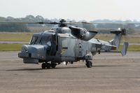 ZZ397 @ EGFH - Visiting Navy Wildcat HMA.2 helicopter operated by AgustaWestland, Yeovil.  - by Roger Winser
