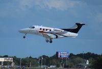 N999TN @ ORL - Phenom 100