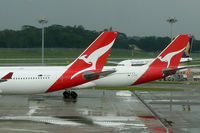VH-QPA @ WSSS - Sisterhips QPA and QPB arrived at Changi within minutes of each other - by Micha Lueck