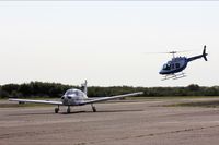 G-BRTX @ EGFH - Resident Cherokee Warrier, Cambrian Flying Club, seen taxxing with G-BXNT waiting to let down at EGFH. - by Derek Flewin
