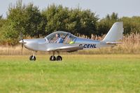 G-CEHL @ EGFH - Visiting EV-97 departing Runway 22. - by Roger Winser