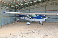 VH-AAF @ YWBV - Beverley Airport WA - aircraft in an open hangar with two others - by Arthur Scarf
