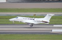 N301TG @ TPA - Phenom 300 - by Florida Metal