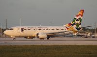 VP-CKW @ MIA - Cayman 737 - by Florida Metal