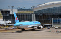 HL7530 @ KDFW - Gate D12 DFW - by Ronald Barker