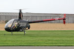 G-CMSN @ EGBR - Robinson R22 Beta at the Real Aeroplane Club's Helicopter Fly-In, Breighton Airfield, North Yorkshire, September 21st 2014. - by Malcolm Clarke