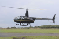 G-EEZR @ EGFH - Visiting Raven II, Thruxton based, seen lifting at EGFH after picking up a passenger, en-route to Preston.