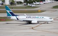 C-FEWJ @ FLL - West Jet 737-700 - by Florida Metal