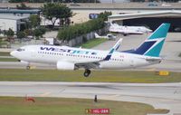 C-GWBN @ FLL - West Jet 737-700 - by Florida Metal