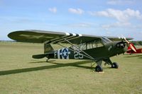 F-BETK @ LFRU - Piper J3C-65 Cub, Static display, Morlaix-Ploujean airport (LFRU-MXN) air show in september 2014 - by Yves-Q