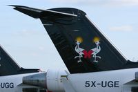 5X-UGE @ LFRU - Canadair Regional Jet CRJ-200ER, BritAir parking area, Morlaix-Ploujean airport (LFRU-MXN) - by Yves-Q