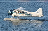C-FEGE @ CYHC - Taxiing in at Vancouver harbour. - by Ken Videan