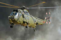 ZA310 @ EGDY - Smoke from pyrotechnics forms the backdrop for this Sea King at RNAS Yeovilton Air Day 2013. - by Arjun Sarup