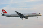 HB-IOF @ EGLL - Swiss - by Chris Hall