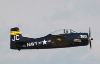 N828JC @ KOSH - North American T-28B - by Mark Pasqualino