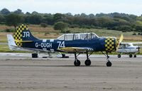 G-OUGH @ EGFH - Resident Yak-52. Marked 62/IV on port side fuselage/fin. - by Roger Winser